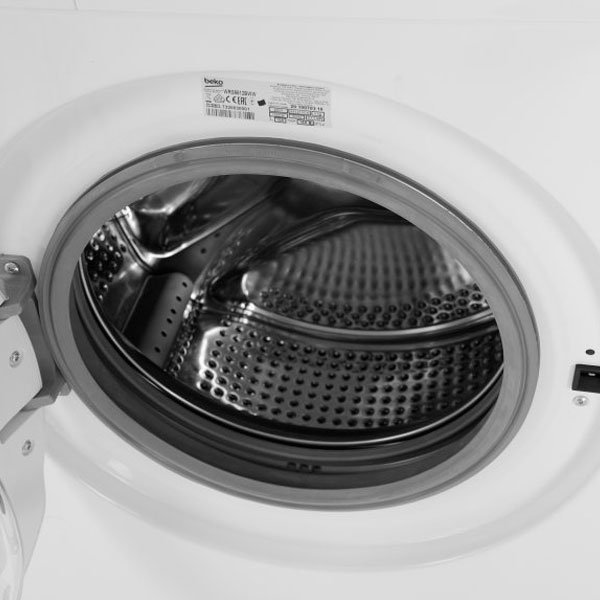 Beko WRS5512BWW барабан из нержавеющей стали — открытый люк, внутренние отверстия