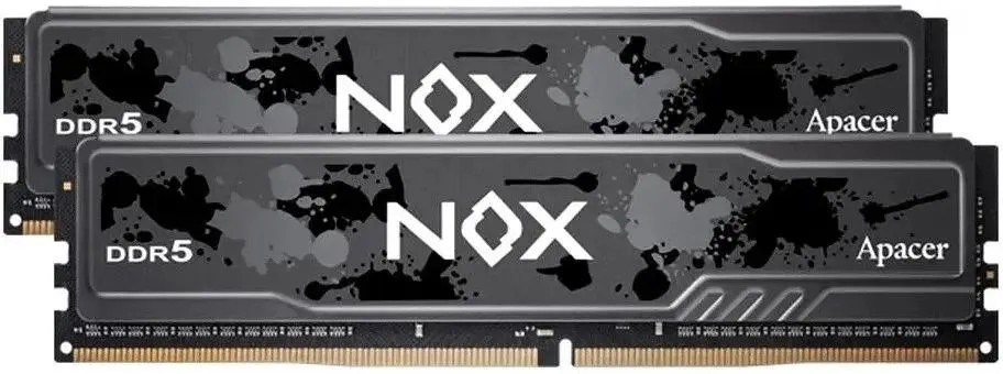 Apacer AH5U32G52C522MBAA-2 два модуля DDR5 32 ГБ 5200 МГц вид сверху с золотыми контактами